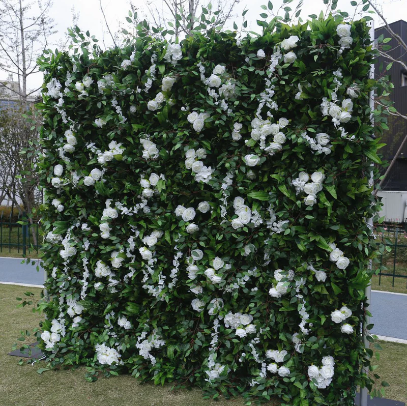 フラワーウォール緑の人工生地は、パーティーのためのカーテンの花の背景を巻き上げます